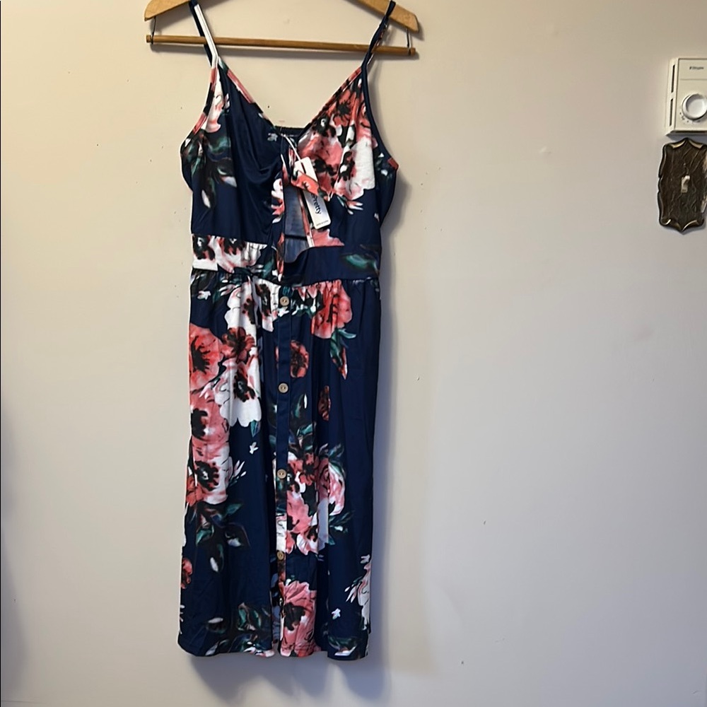Vote pretty sundress. Peek a boo chest with bow button front size XL new/tag